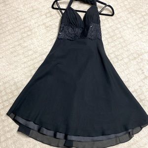 Gorgeous halter style evening dress . White house black market size 0.